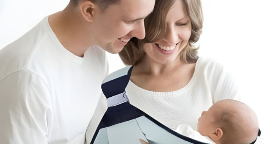 Sling porte-bébé naissance porté par un parent avec nouveau-né