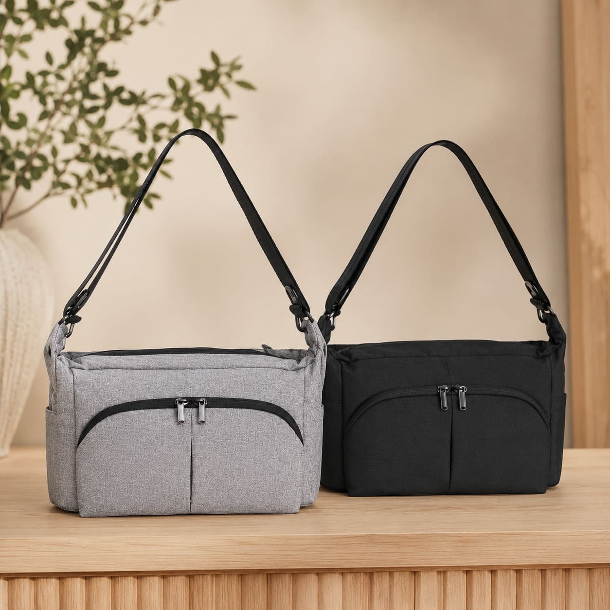 Comparaison des variantes gris et noir de l’organisateur de poussette Nomade Go