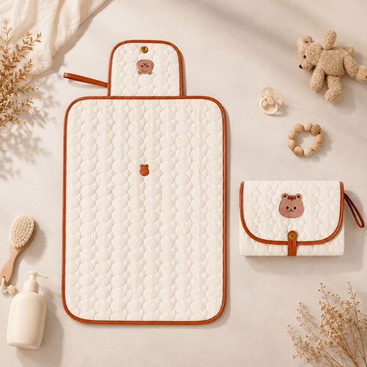 tapis à langer nomade Petit Cocon variante Écureuil présenté plié et déplié 