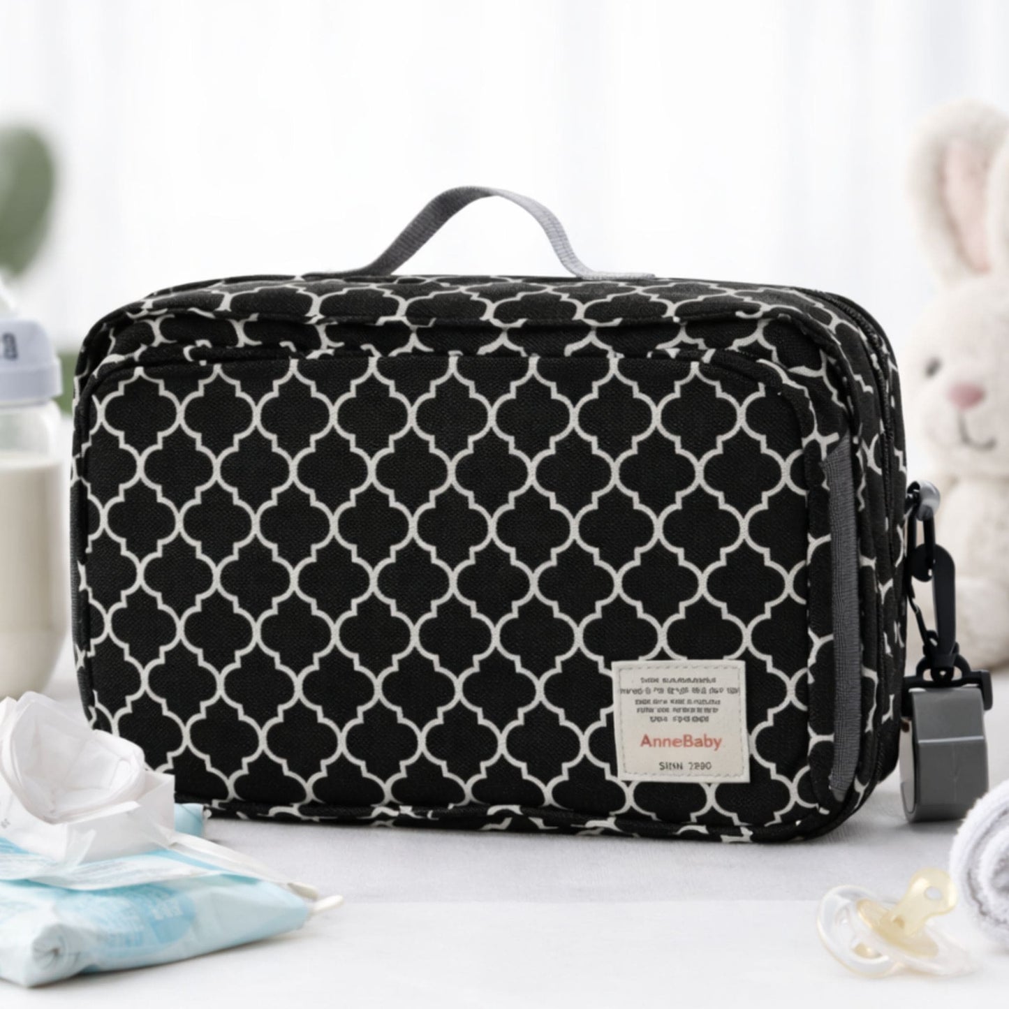 Organisateur poussette Nomade noir motif géométrique sac bébé rangement pour biberon couches et lingettes