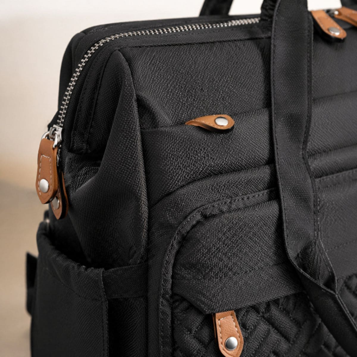 Détail fermeture et qualité du sac à dos à langer Nomade+ 