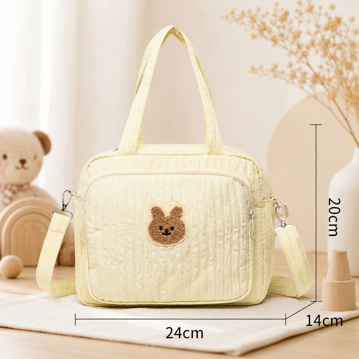 Sac à langer Petit Câlin beige avec dimensions 24 × 14 × 20 cm