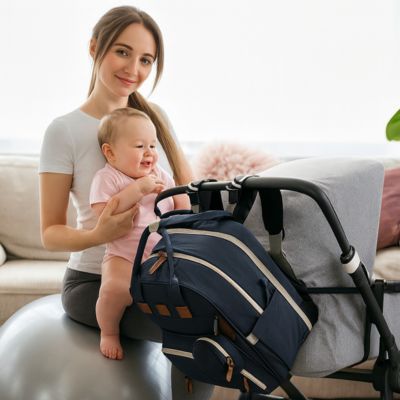 sac-a-dos-a-langer-nomade-bleu-accroche-a-la-poussette