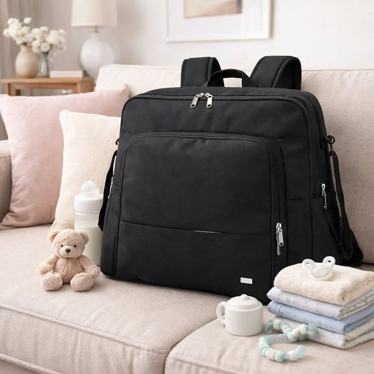 sac à dos à langer Parent'Hez noir  présenté avec accessoires pour bébé